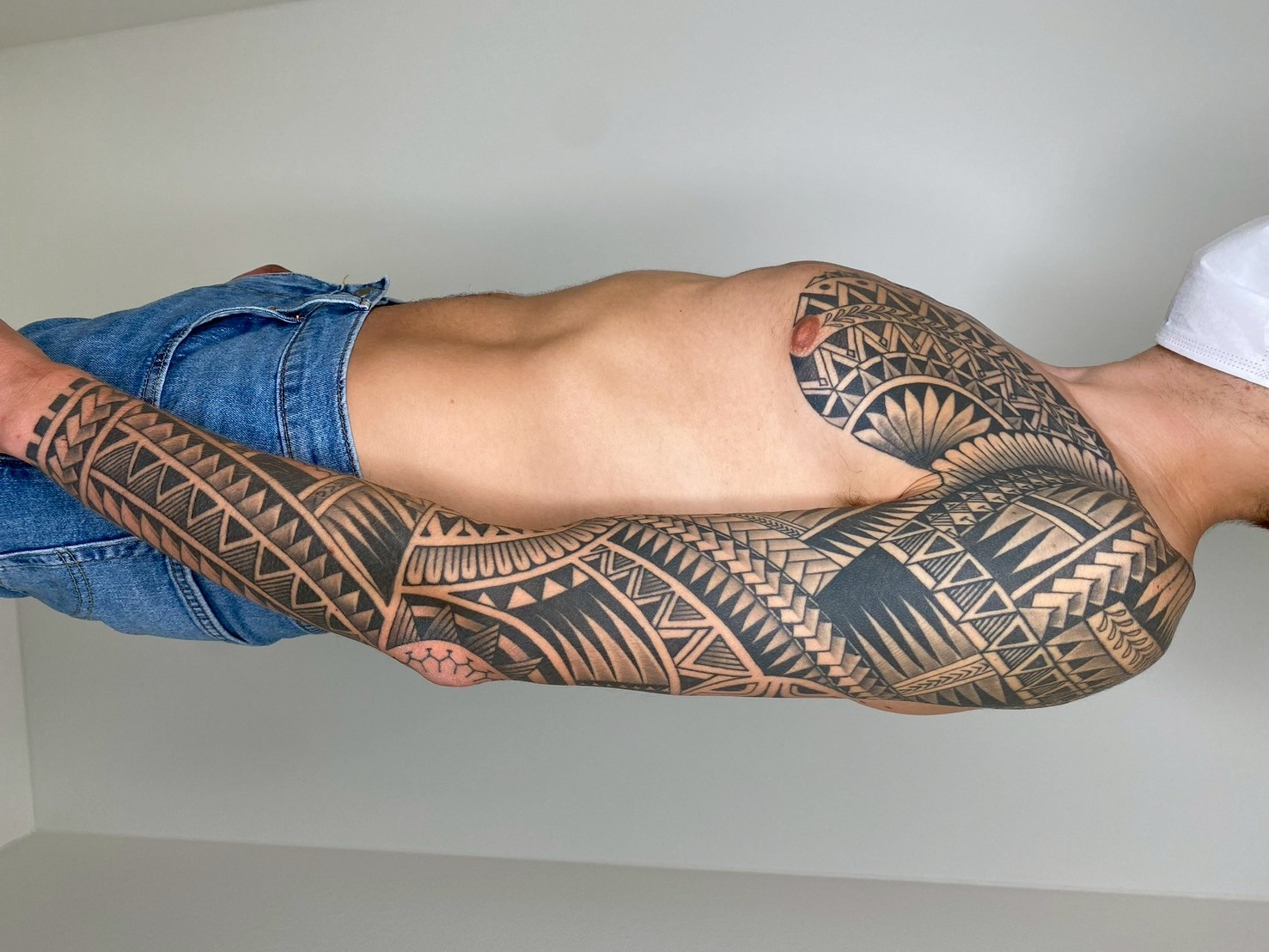 Polynesian tribal full sleeve and chest tattoo