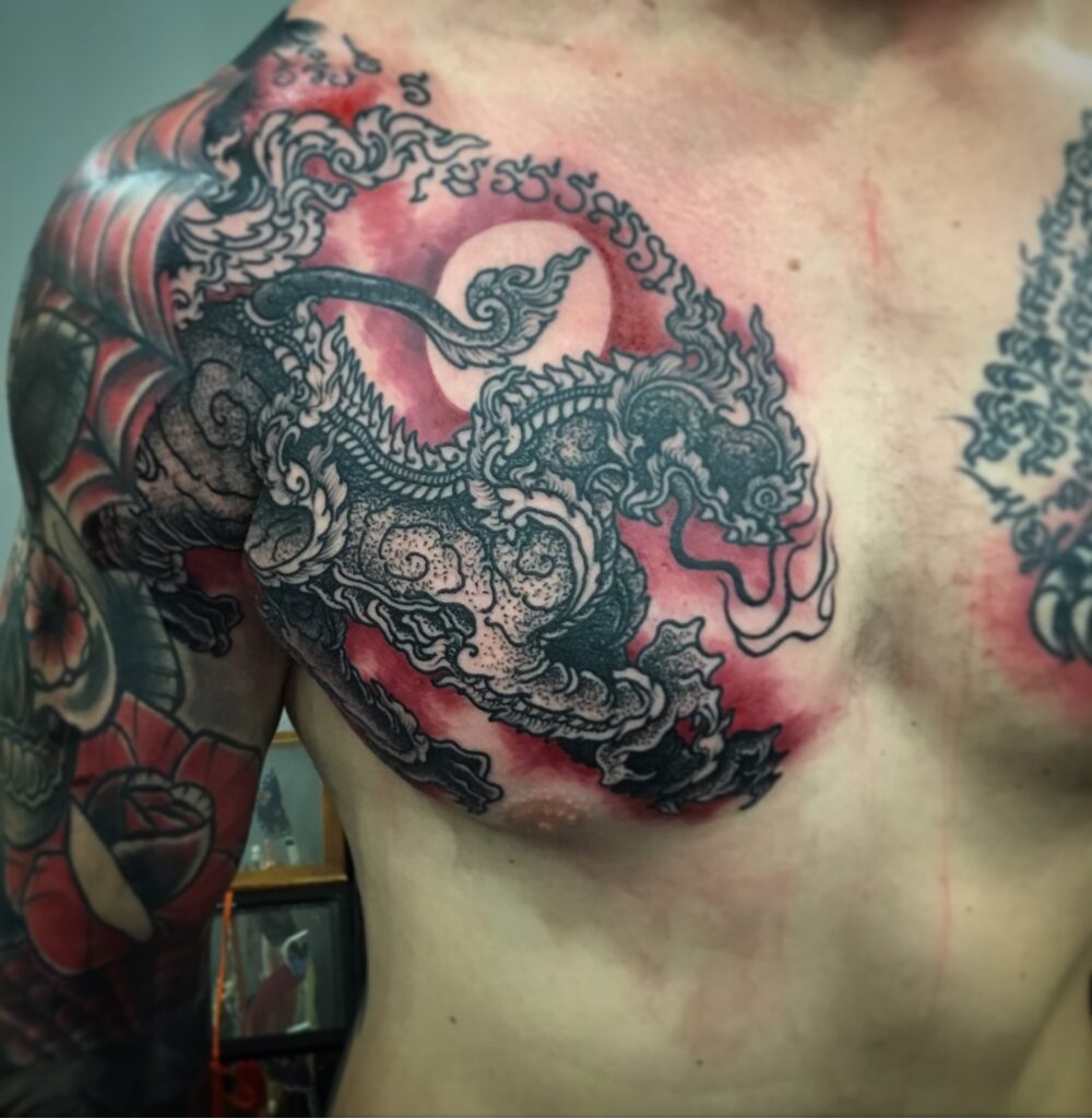 Neo Thai Himmapan Lion Chest Tattoo by Mr.X at Dragon King Tattoo Pattaya”