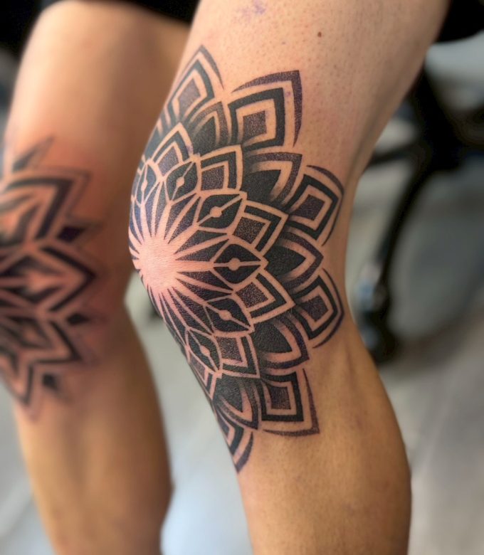 Geometric mandala thigh tattoo blackwork custom design in Pattaya
