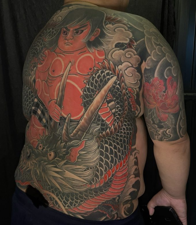 Japanese dragon and Kintaro full back tattoo side view by Dragonking Tattoo Pattaya