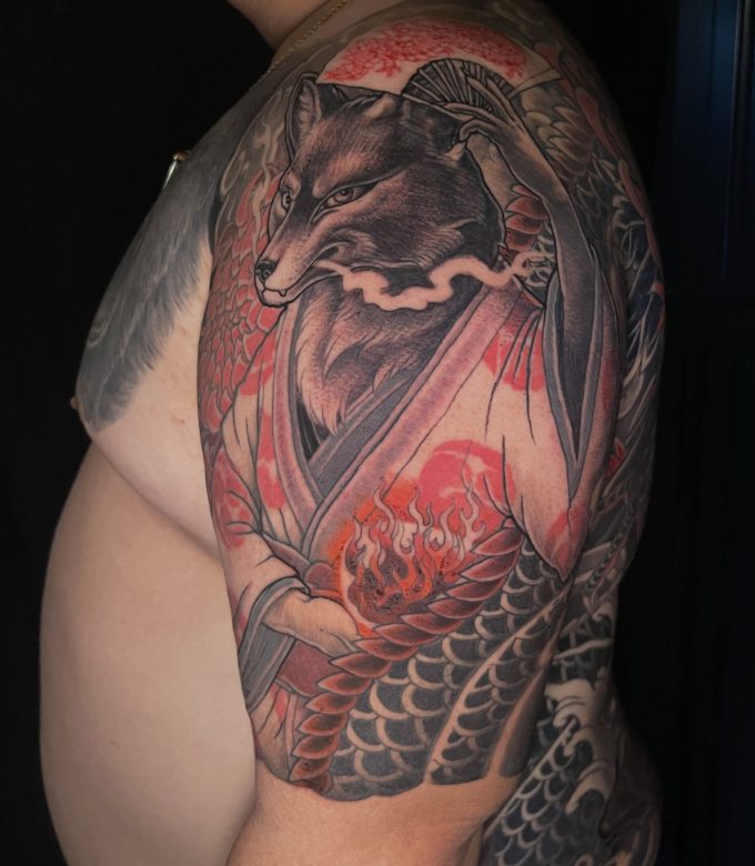 Japanese Kitsune fox tattoo detail with dragon scale sleeve by Dragonking Tattoo Pattaya