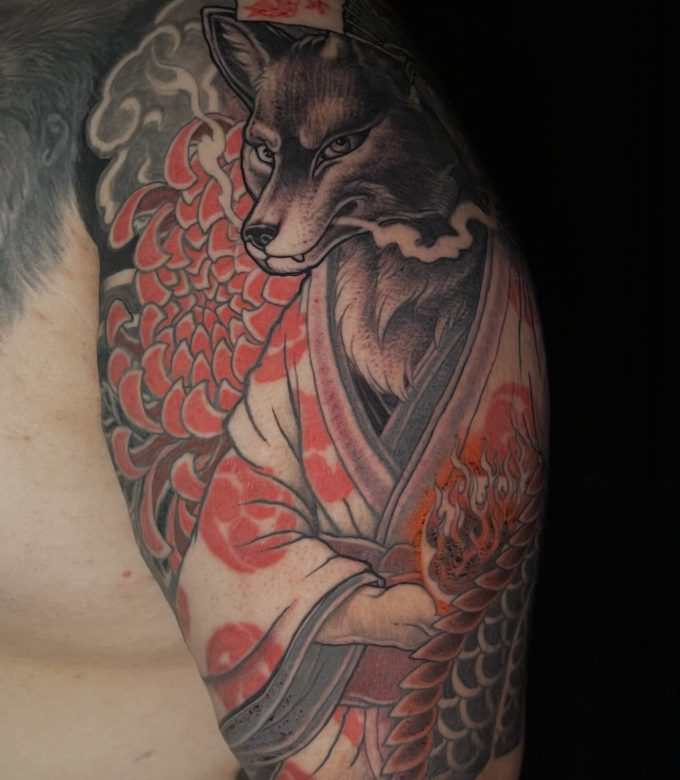 Japanese Kitsune fox tattoo detail with dragon scale sleeve by Dragonking Tattoo Pattaya