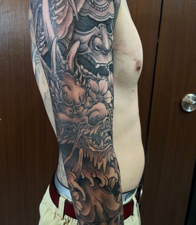 Japanese dragon and hannya mask full sleeve tattoo, black and grey irezumi style, Dragonking Tattoo Pattaya