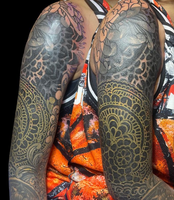 Ornamental Mandala skull blackwork full sleeve tattoo in Pattaya